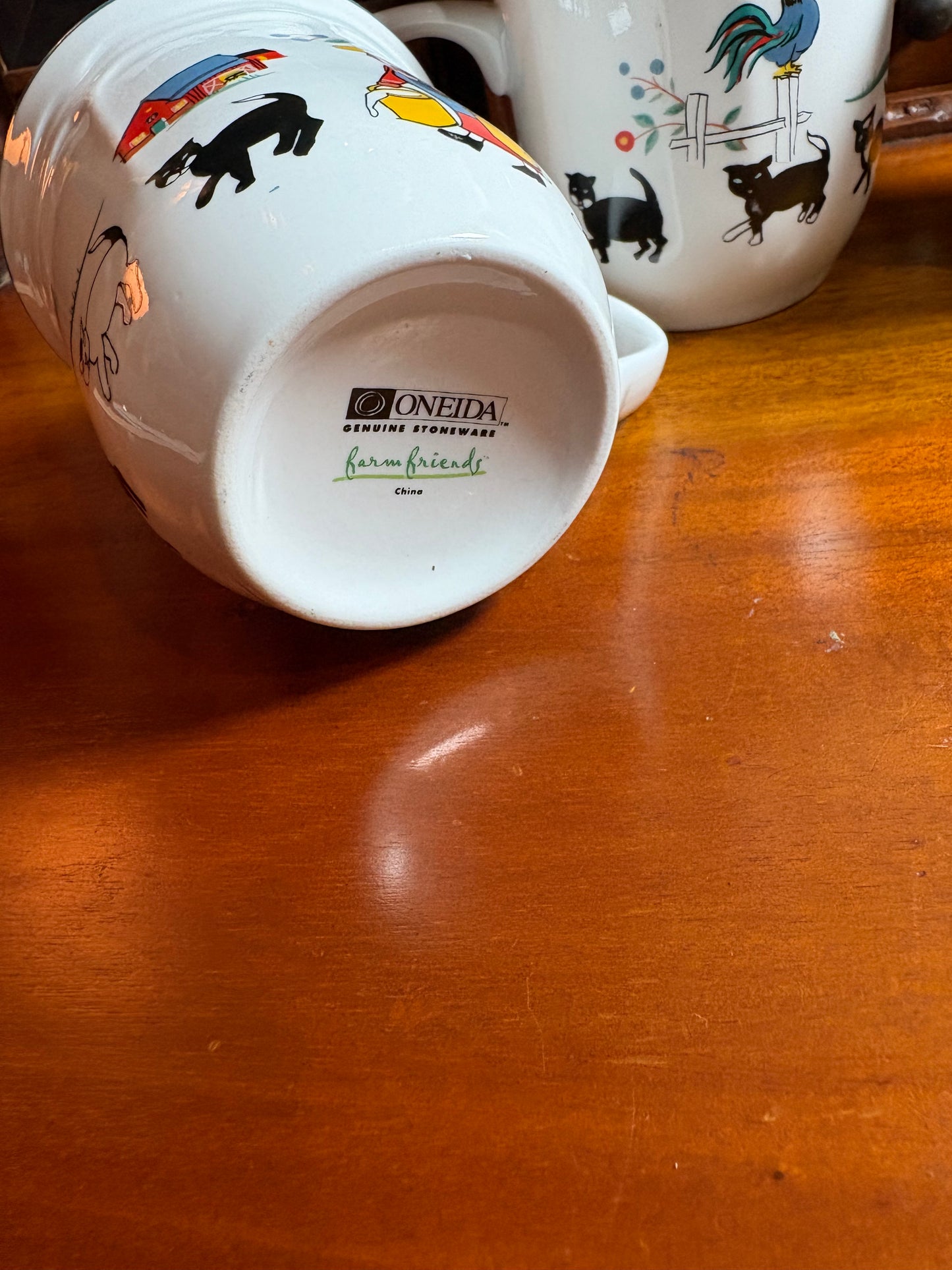Oneida Stoneware Farm Motif Mugs