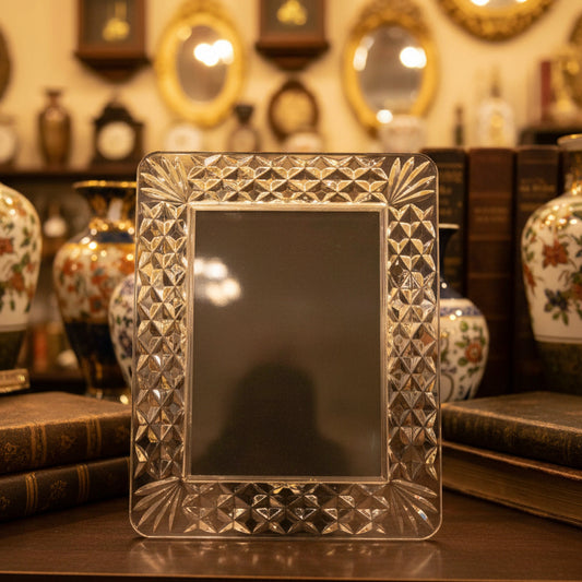 Crystal picture frame on a green satin background